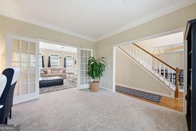 Nestled in the highly sought-after Waters Edge, this traditional - photo 7
