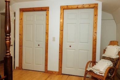 Surrounded by nature, this charming 3-bedroom, 2-bath waterfront - photo 17