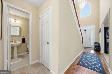 Nestled in the highly sought-after Waters Edge, this traditional - photo 10