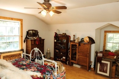 Surrounded by nature, this charming 3-bedroom, 2-bath waterfront - photo 20
