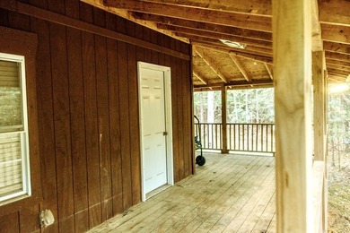 Surrounded by nature, this charming 3-bedroom, 2-bath waterfront - photo 24