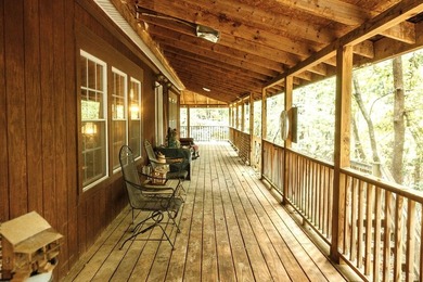 Surrounded by nature, this charming 3-bedroom, 2-bath waterfront - photo 25