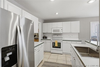 Welcome to your two-level lakefront retreat in the heart of the - photo 10