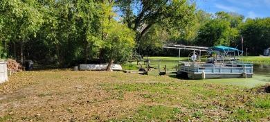 Waterfront lot on the Chain O'Lakes featuring a private pier - Lake Lot For Sale in Fox Lake, Illinois