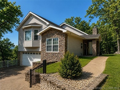 6835 Saint Tropez Circle in Osage Beach offers inviting Lake of - photo 1