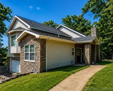 6835 Saint Tropez Circle in Osage Beach offers inviting Lake of - photo 2