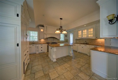 Stunning Center Hall Colonial with Timeless Charm & Ocean Views - photo 17