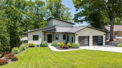 Experience Open Space Luxury lakefront living in this custom - photo 2