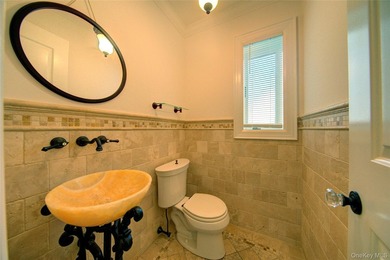 Stunning Center Hall Colonial with Timeless Charm & Ocean Views - photo 33