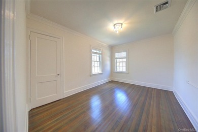 Stunning Center Hall Colonial with Timeless Charm & Ocean Views - photo 35