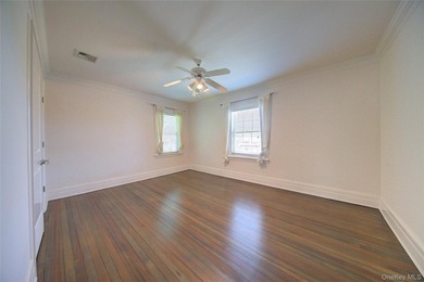 Stunning Center Hall Colonial with Timeless Charm & Ocean Views - photo 38
