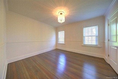 Stunning Center Hall Colonial with Timeless Charm & Ocean Views - photo 39