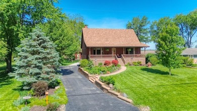 Nestled on a beautifully maintained 1.35 acre lot, with - photo 1