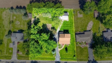 Nestled on a beautifully maintained 1.35 acre lot, with - photo 2