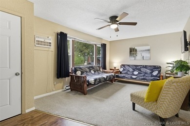 Lake living without the waterfront price! Welcome to this - photo 5