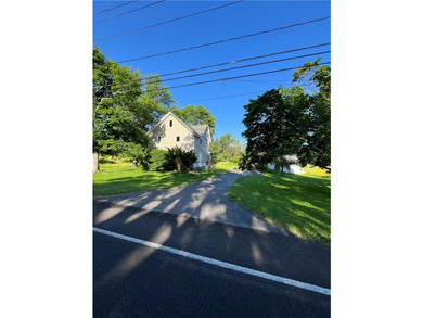 Discover the potential at 6705 E Townline Rd, Williamson, NY - photo 1