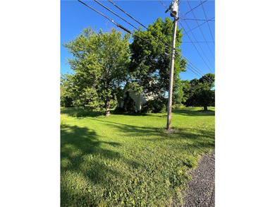Discover the potential at 6705 E Townline Rd, Williamson, NY - photo 3