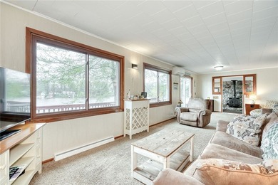 Tucked into the hillside, this awesome lakefront home offers so - photo 11