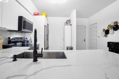 Welcome to this bright and inviting 2-bedroom, 1-bathroom condo - photo 12