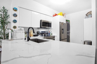 Welcome to this bright and inviting 2-bedroom, 1-bathroom condo - photo 13
