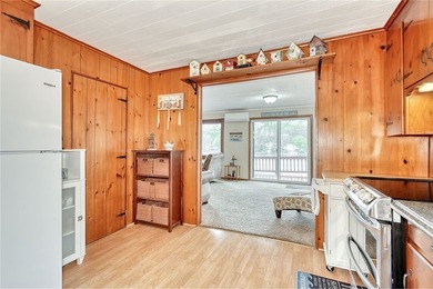 Tucked into the hillside, this awesome lakefront home offers so - photo 14