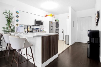 Welcome to this bright and inviting 2-bedroom, 1-bathroom condo - photo 14