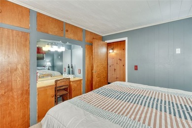 Tucked into the hillside, this awesome lakefront home offers so - photo 20