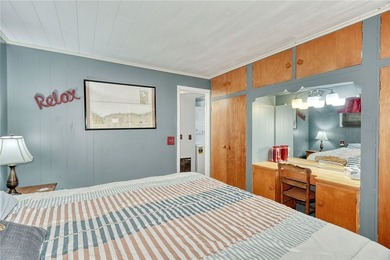 Tucked into the hillside, this awesome lakefront home offers so - photo 21