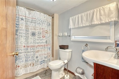 Tucked into the hillside, this awesome lakefront home offers so - photo 22