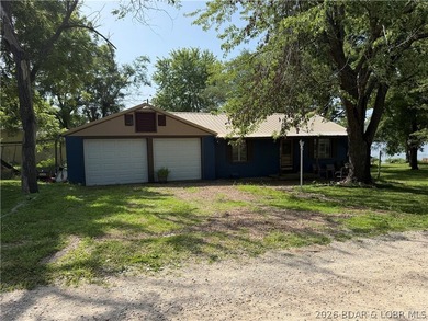 Rare 4-Lot Lakefront Property;Bonus Dock Lot Embrace this - photo 2
