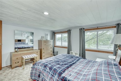 Tucked into the hillside, this awesome lakefront home offers so - photo 32