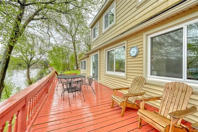 Tucked into the hillside, this awesome lakefront home offers so - photo 36