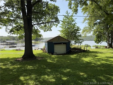 Rare 4-Lot Lakefront Property;Bonus Dock Lot Embrace this - photo 10