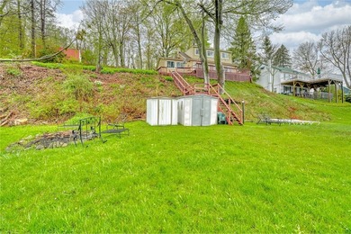 Tucked into the hillside, this awesome lakefront home offers so - photo 43