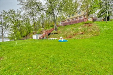 Tucked into the hillside, this awesome lakefront home offers so - photo 44