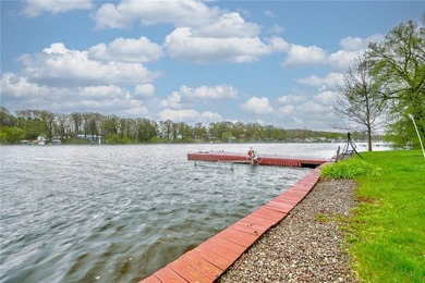 Tucked into the hillside, this awesome lakefront home offers so - photo 46
