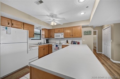 Life at Lake of the Ozarks is calling with this Gorgeous Condo - photo 3