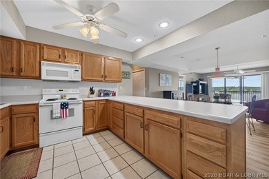 Life at Lake of the Ozarks is calling with this Gorgeous Condo - photo 6