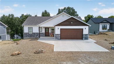 Enjoy waterfront living in this stunning 4-bedroom, 2.5-bath - photo 1