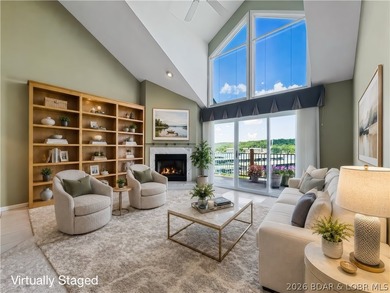 Welcome to this coveted top-level lakefront condo, offering over - photo 1