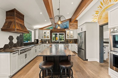 Welcome to a spectacular lakefront estate with sweeping views - photo 11