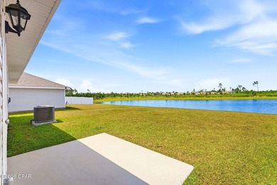 PRICE REDUCTION! Experience peaceful pondfront living in this - photo 4