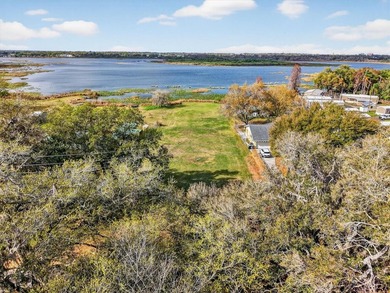 Lakefront homesite with 70 FEET OF LAKEFRONTAGE on BEAUTIFUL - photo 8