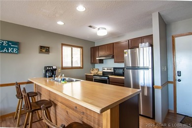 PERFECT LAKE PACKAGE!!! Turn Key Condo that includes 10x24 boat - photo 5