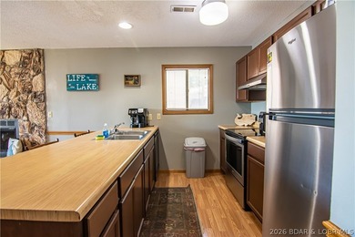 PERFECT LAKE PACKAGE!!! Turn Key Condo that includes 10x24 boat - photo 6