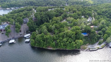 Enjoy over 200 feet of lakefront with deep water, expansive main - photo 5