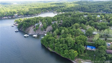 Enjoy over 200 feet of lakefront with deep water, expansive main - photo 6
