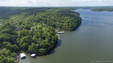 Enjoy over 200 feet of lakefront with deep water, expansive main - photo 9