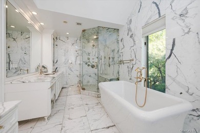 A circular driveway leads to this spectacular fully renovated - photo 25