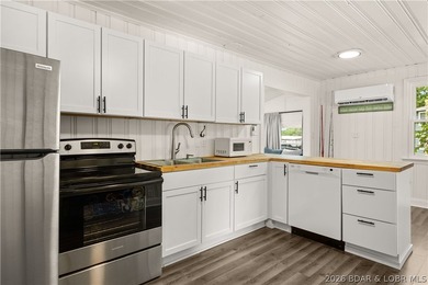 Experience premier lakefront living at its finest in Sunrise - photo 10